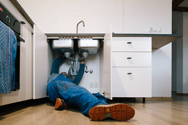 Professional Emergency Plumber technician working in Elkhorn City, KY